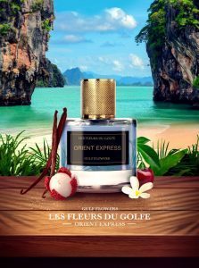 Le Parfum des fleurs du golfe Orient Express dans un beau flacon sur une plage